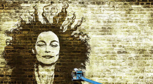 一个骑着鹤的男人在墙上画着美丽女人的脸图片下载