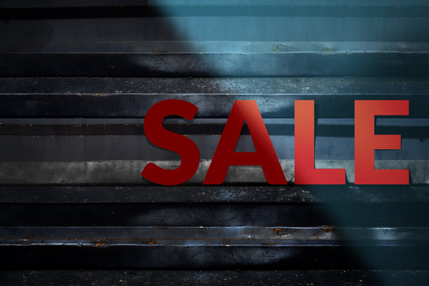 销售和促销概念的深色金属墙的背景图片下载