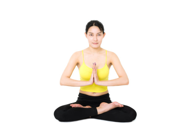 有吸引力的美丽的女人尝试在祈祷姿势练习瑜伽孤立的白色背景。运动与保健理念。图片下载