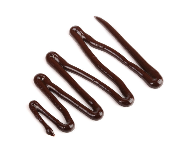 热融化的巧克力浇孤立的白色背景，俯视图图片下载