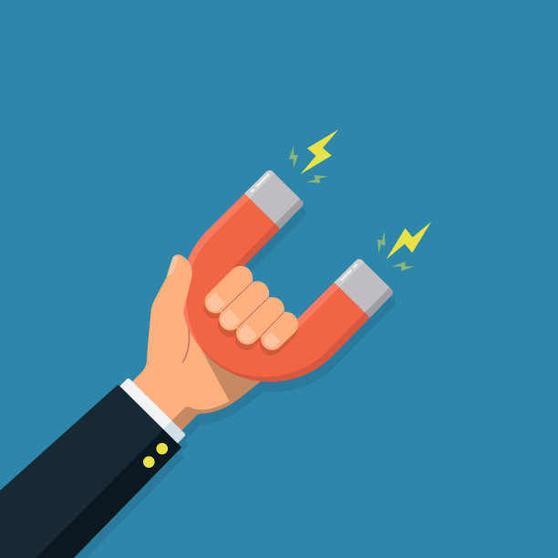 一个有磁铁的商人的手。经营理念吸引资金、客户和投资。图片下载