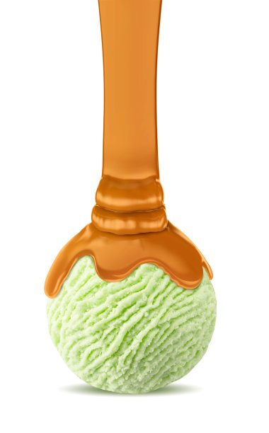 太妃焦糖浇在冰淇淋勺上图片下载