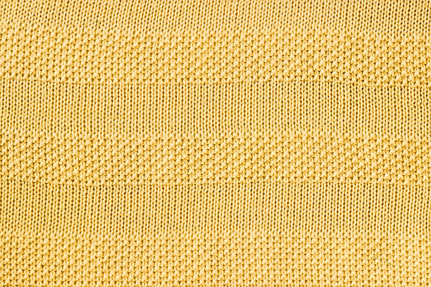 针织的背景。编织模式。针织质地。针织样品。素材图片