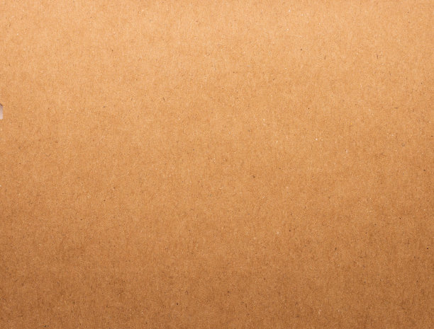 纸板纹理背景。牛皮纸材料。空白的纸板。图片下载