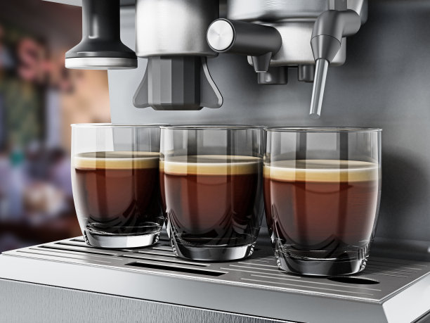 咖啡机的托盘上放着咖啡杯素材图片