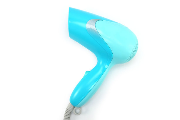 蓝色的吹风机。图片下载