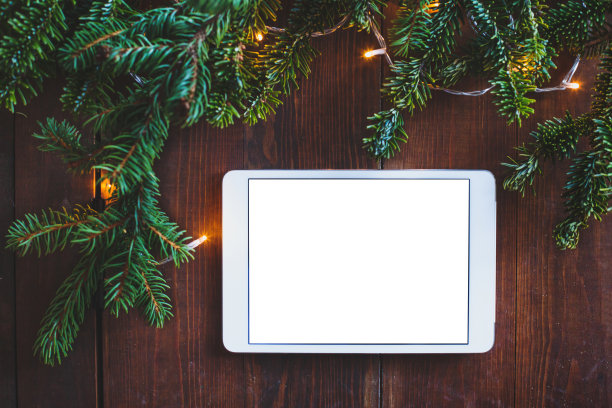 数码平板电脑的圣诞节日背景图片下载
