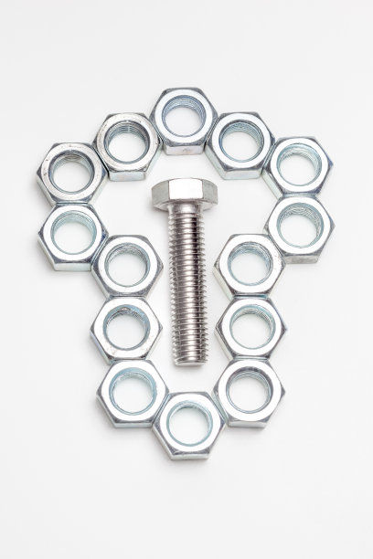 一个躺螺栓和各种螺母图片下载