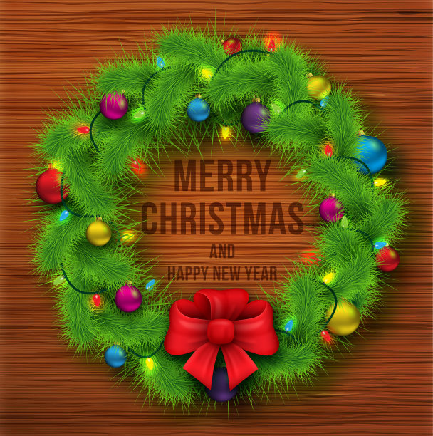 绿色的圣诞花环在木材的背景图片下载