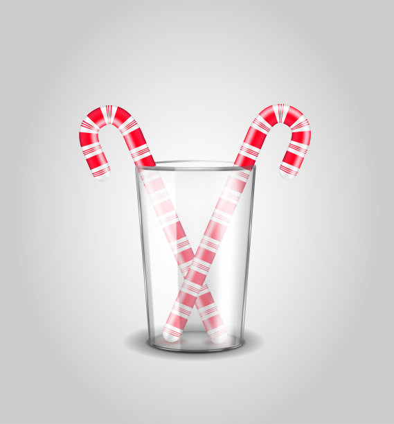 圣诞糖果手杖在透明的玻璃图片下载