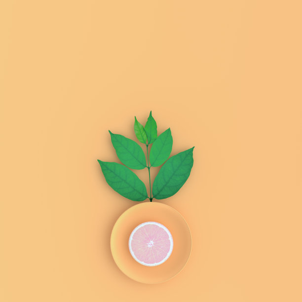 粉红色的柑橘片放在盘子里，绿色的叶子在橙色的背景上图片下载
