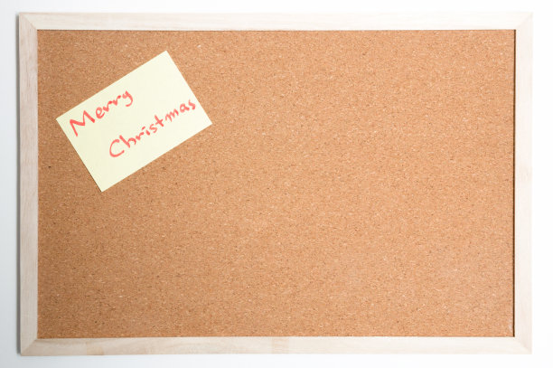 黄色的木板上写着圣诞快乐图片下载