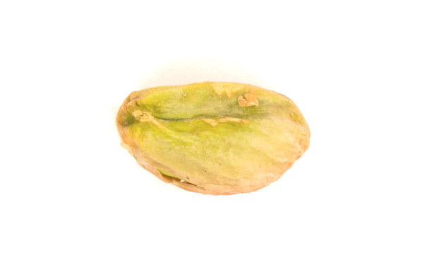 单颗开心果仁的微距视图素材图片