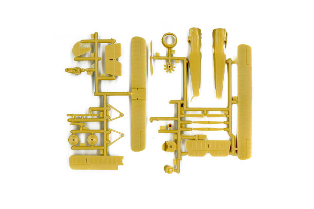 一个未组装的老式三架飞机的塑料模型套件图片下载