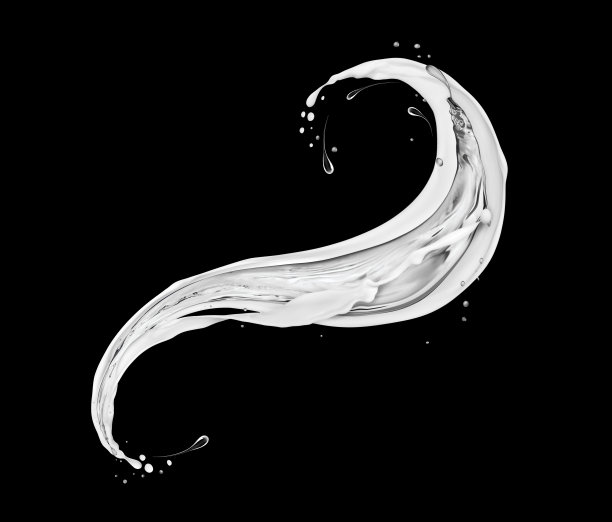 在黑色背景上洒上鲜奶油图片下载