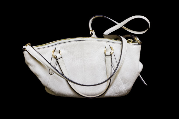 女人的手提包孤立在黑色背景上图片下载
