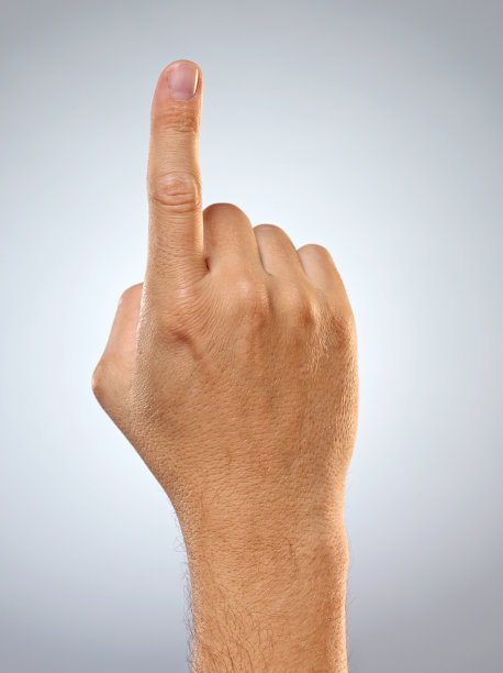 男人的手。一根手指指向。图片下载