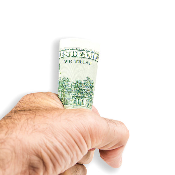 一个白人手里拿着一美元的钞票图片下载