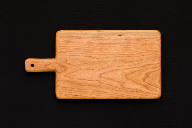 樱桃木砧板上涂黑棉，手工木砧板图片下载