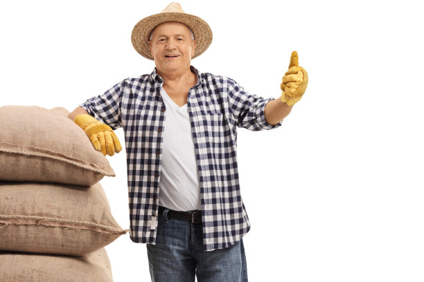 老农民靠在麻袋上，做了一个大拇指向上的手势图片下载