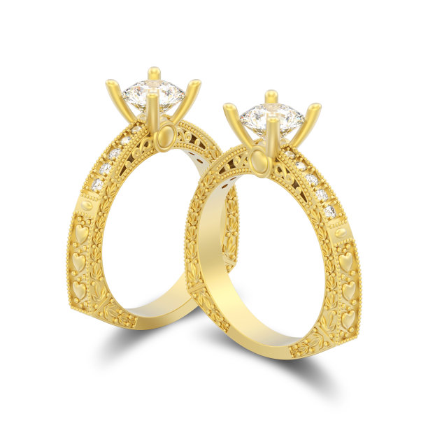 3D插图孤立的两个黄金装饰钻石戒指装饰和心与阴影图片下载