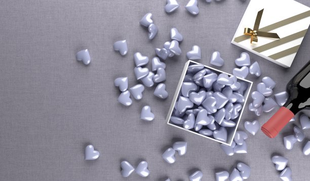 红酒瓶与打开的礼品盒满紫心图片下载