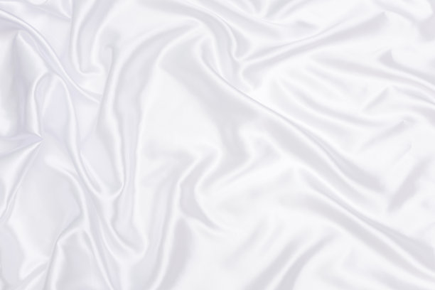 白色织物的背景和纹理，褶皱的白色织物为抽象图片下载