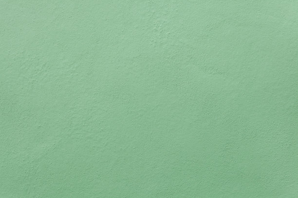 绿色粉刷的灰泥墙。背景纹理。图片下载