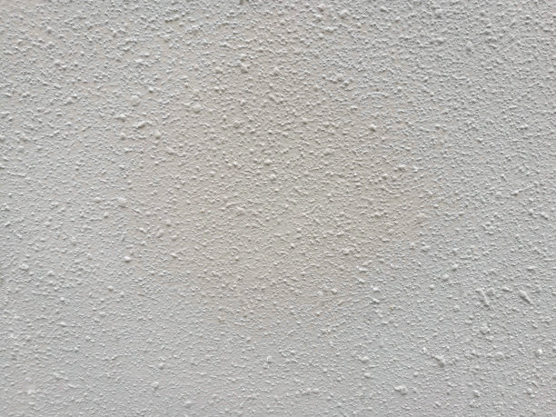 水泥墙纹理/粗糙的混凝土表面-近距离观看。图片下载