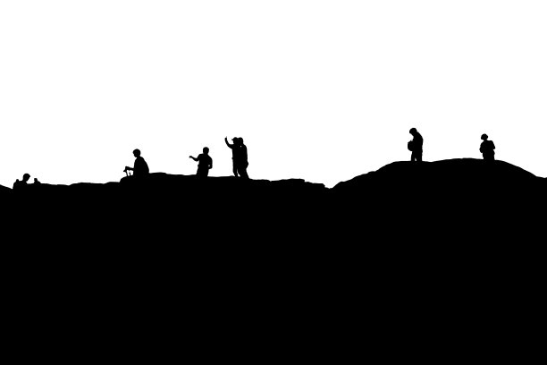 摄影师在山上剪影。摄影学校，摄影课程。图片下载