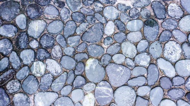 纹理，背景是灰色的小圆石图片下载