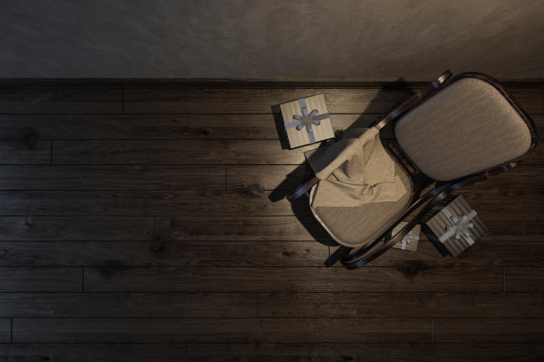 附近有摇椅和礼品盒的空房间图片下载