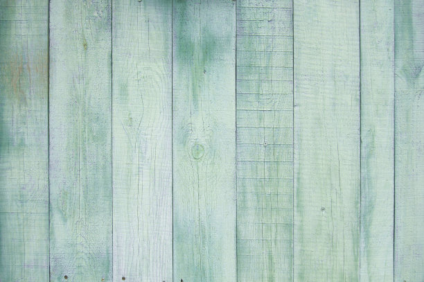 绿色的旧木栅栏。木栅栏的背景。图片下载