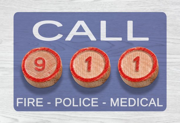 描绘911紧急电话号码的三件木制品图片下载