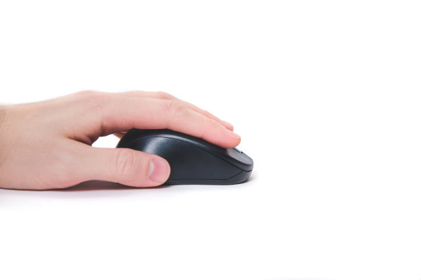 手放在电脑鼠标上。图片下载