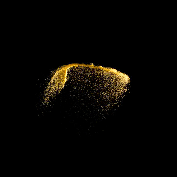 黑色背景上发生黄沙爆炸。抽象的沙子云。金色的沙子在黑暗的背景上飞溅。桑迪飞在空中波浪。图片下载