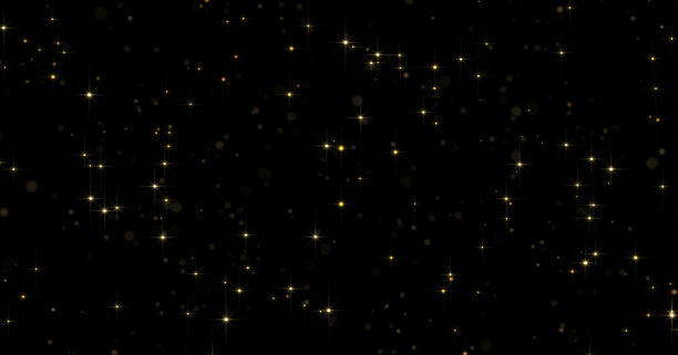 金色颗粒照亮背景与光辉光散景和闪烁的灰尘光魔术效果。金色的颗粒和闪烁的发光灯为豪华豪华的圣诞背景设计图片下载