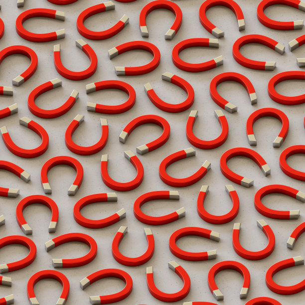 在一个简单的混凝土表面上的一个紧密网格的等距红色磁铁图片下载