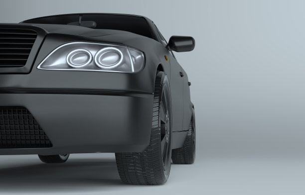 在灰色演播室背景上的汽车特写图片下载