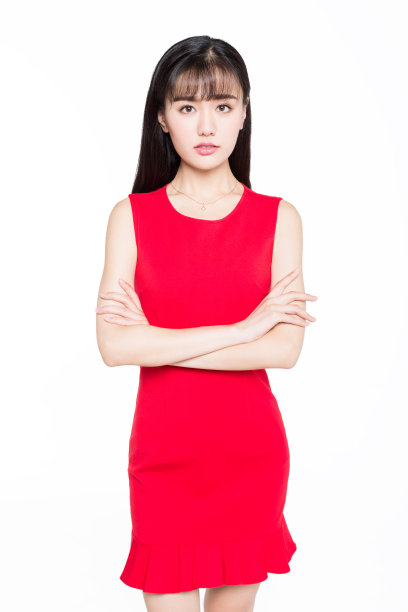 年轻的亚洲妇女身穿红色连衣裙的肖像素材图片