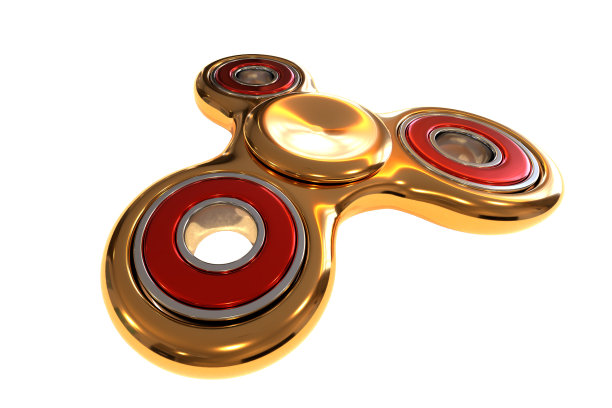 指尖陀螺黄金，压力和焦虑缓解，手指玩具，3d渲染孤立的白色背景图片下载
