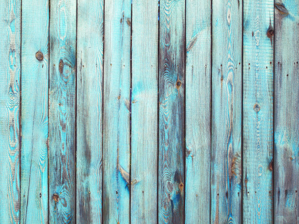 木制背景纹理。破旧的蓝色木栅栏。图片下载