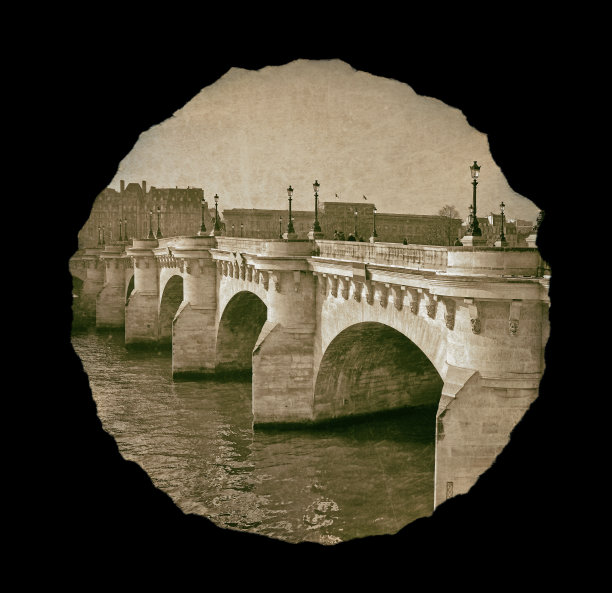 撕破的纸上的旧巴黎照片。图片下载