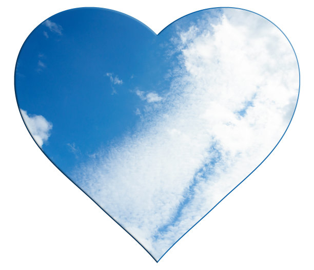 心形符号雕刻从照片和孤立的白色背景。蓝天白云图片下载