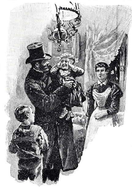 父亲抱着儿子和他说话图片下载