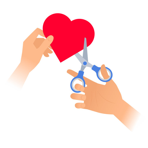 用剪刀把一颗心剪下来。图片下载