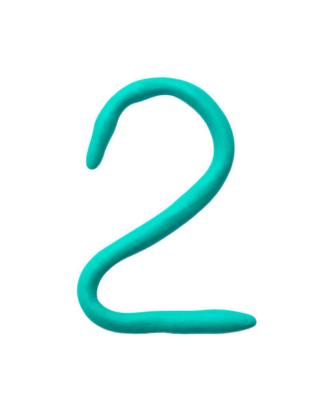 特写绿色橡皮泥的孩子在2号孤立的白色背景与剪切路径图片下载