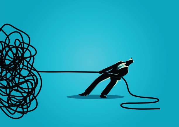 试图解开缠结的绳子或电缆的商人图片下载