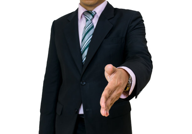 握手的商人穿着黑色西装和领带的白色背景图片下载