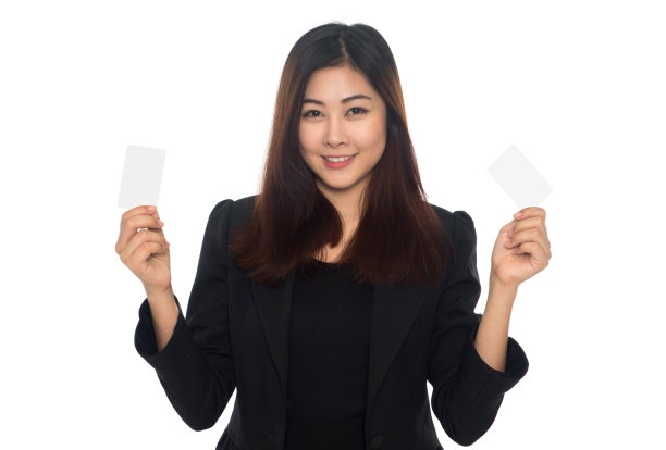 女商人拿着白色背景的名片图片下载